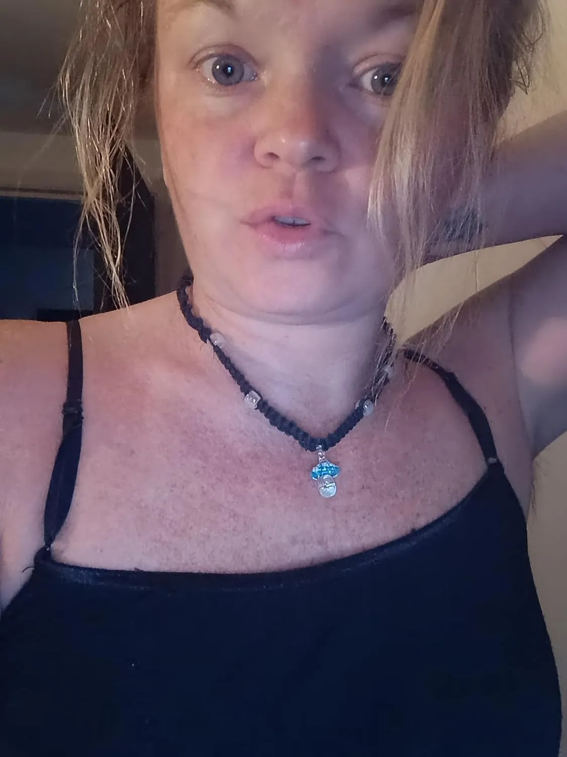 Glow mushroom hemp necklace (Light Blue on Black Cord)