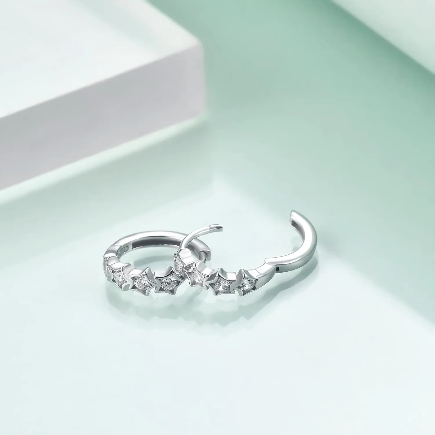 Rnivida 925 Sterling Silver Small Stars Cross Huggie Hoop Earring | Hypoallergenic Dainty Earrings for Women